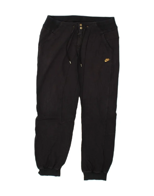 NIKE Womens Tracksuit Trousers Joggers UK 12/14 Large Black Cotton